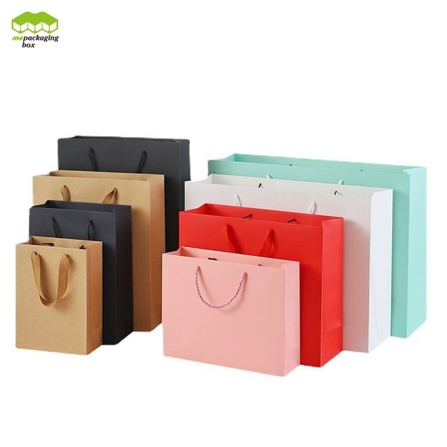 كيس ورقي ذهبي بشعار إحباط الورق بالليزر